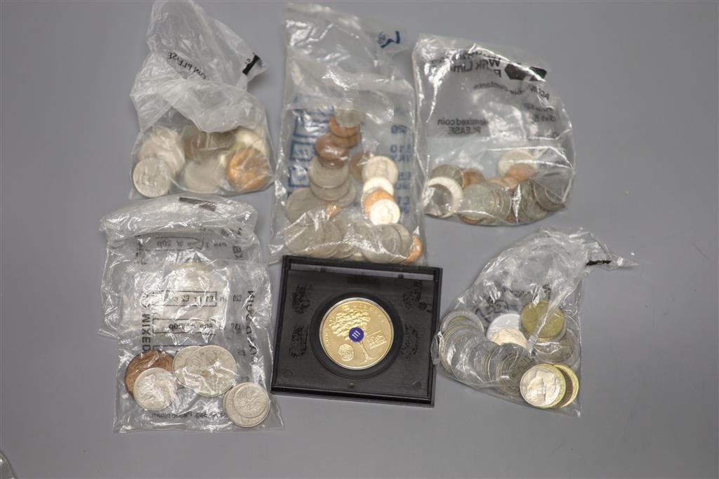 A mahogany box of world coins